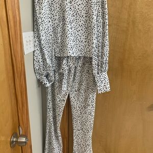 Pretty Lavish matching top and bottoms. Silk material. Crop top. Runs small.